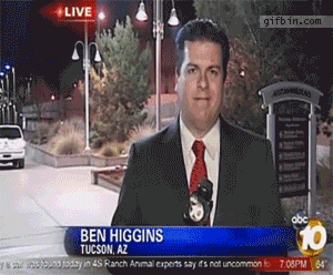 sports-reporter-almost-run-over-by-car.gif