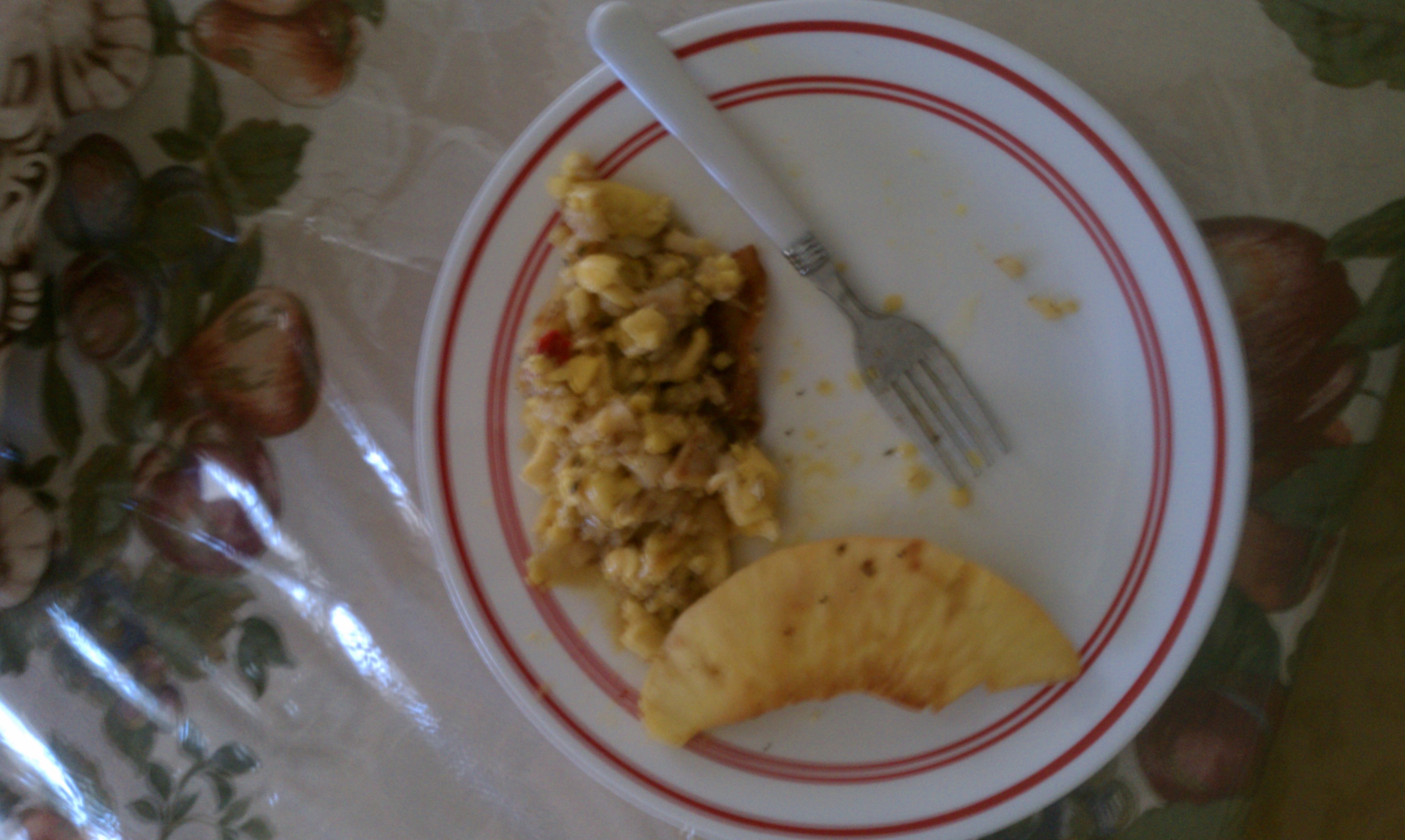 Ackee, Salted Codfish, and Bacon bits served with Breadfruit.jpg